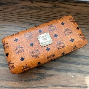 MCM leather clutch and sunglass case